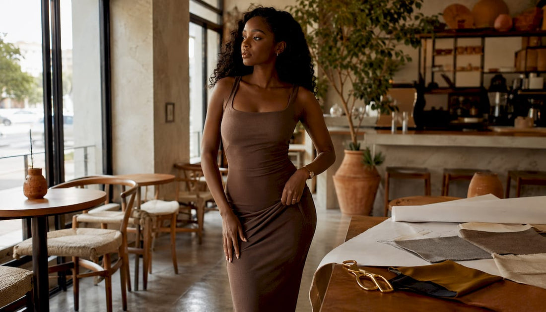 Confident woman modeling tailored body contour dress