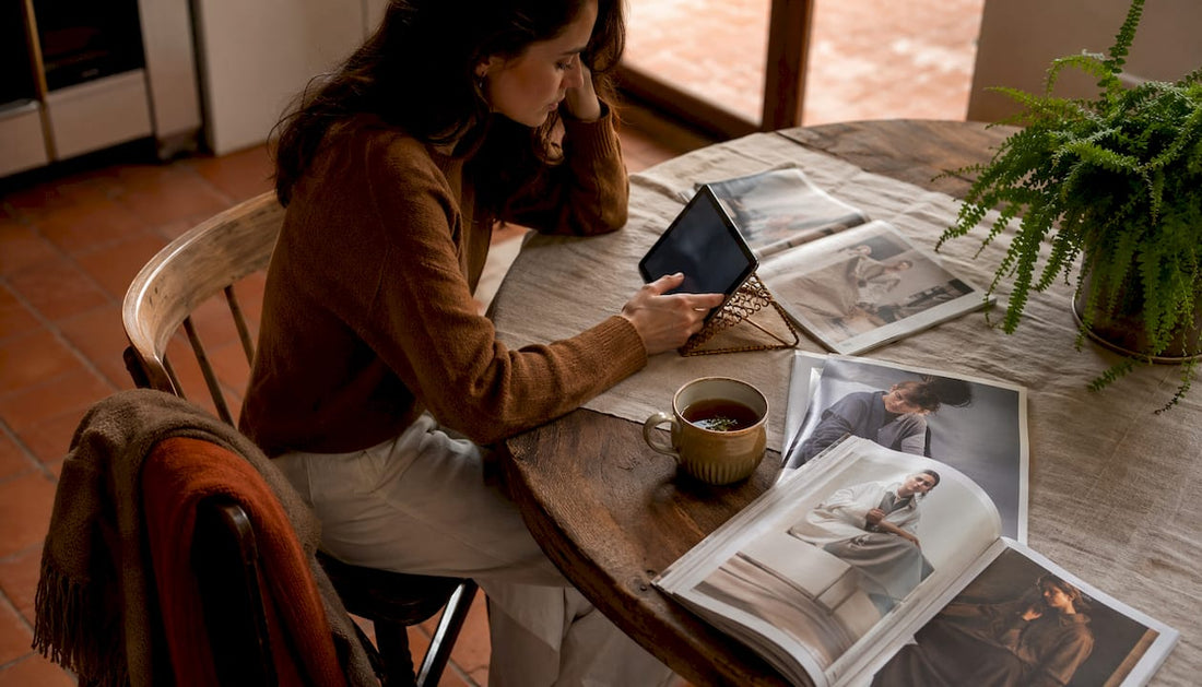 Woman exploring fashion trends on tablet