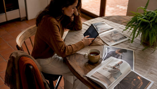Woman exploring fashion trends on tablet