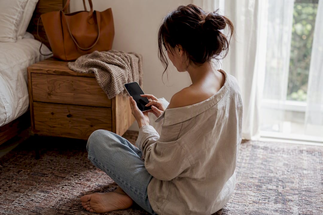 Woman browsing fashion looks on phone