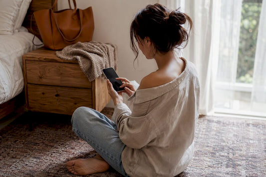 Woman browsing fashion looks on phone