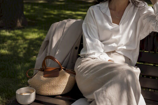 Detail of brunch outfit elements on cafe table