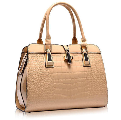 Beige crocodile-texture leather handbag with double handles and gold accents