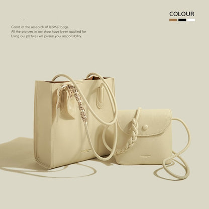 Two beige leather handbags with braided straps on a neutral background
