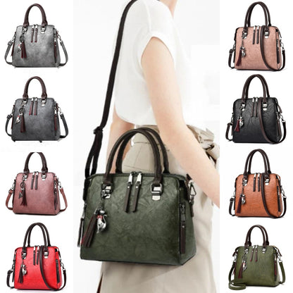 Woman carrying a stylish leather handbag with tassel in various colors, fashion accessory collection